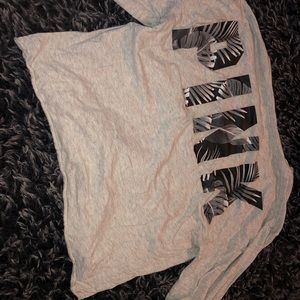 Crop long sleeve VS pink shirt.